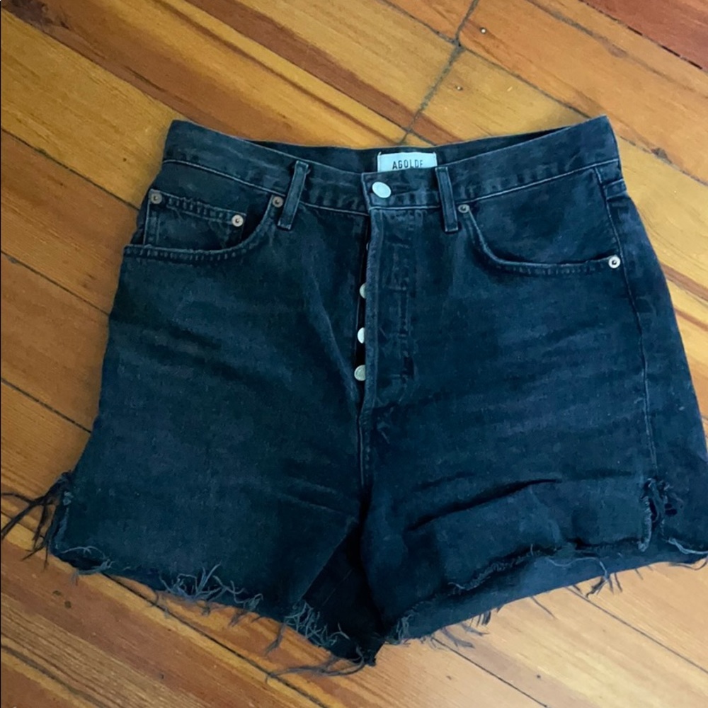 Black denim shorts by AGOLDE. Size 28.